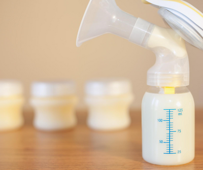 8 Signs You're Making Too Much Breast Milk (And What To Do About It)